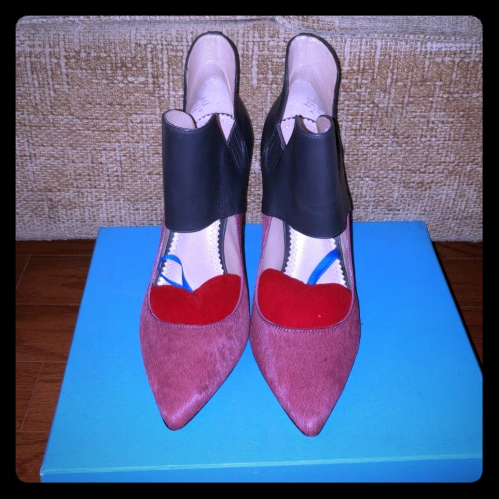 Shoes worn once by client in fashion show.